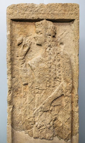 Funerary stele with female figure, Crete, 6th century BC (photo)