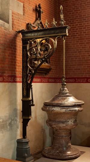 Parish church Saint-Luc. Font. Marble and ironware.