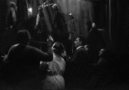 The puppeteers behind the stage of the Haenneschen Theatre at Cologne, Germany 1930s (b/w photo)