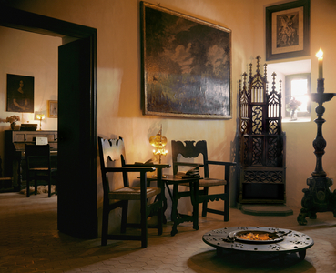 Cell with brazier and tall prior's chair, Carthusian Abbey of Valdemosa, Mallorca, Spain (photo)