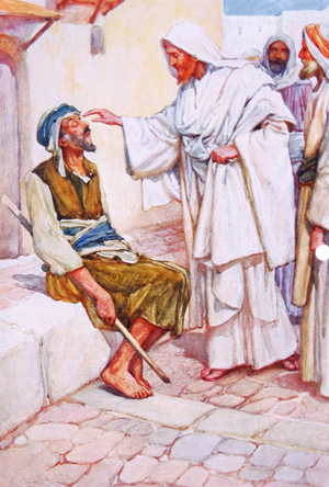 Jesus heals a blind man.