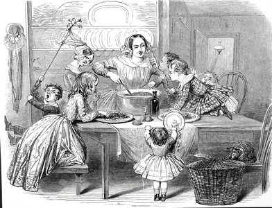 A Christmas Pudding being taken up