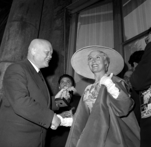 On June 26, 1956 in Paris, French Secreatry of State To Industry Maurice Lemaire Giving A "Victoire Du Cinema" (French Movie Prize) To Actress Michele Morgan (b/w photo)