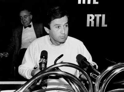 Chairman of Tvchannel Jean Drucker during Broadcast News on The-Radio October 28, 1985 - Behind Him Is Jacques Rigaud, Chairman of This-Radio (b/w photo)