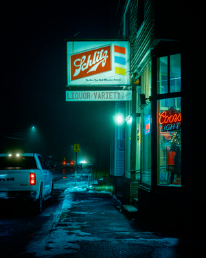 Ferry Street Package Store vintage sign at night, Easthampton, Massachusetts, USA, 2025 (photo)