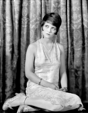1929: Clara Bow (1905 - 1965) Wearing A Lace Dress In A Publicity Photo For Her Film, 'The Saturday Night Kid'.