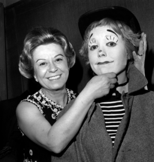 Giulietta Masina In The Lodge Of The Clown Annie Fratellini L Helping Adjust Her Makeup To Make She Look Like La Strada's Gelsomina On December 3, 1970 (b/w photo)