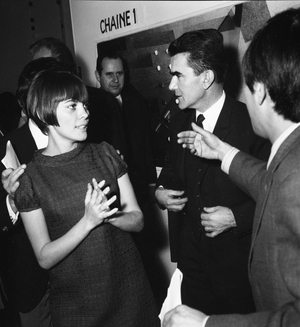 Mireille Mathieu and Jean Bernard Dupont backstage on the TV set for a New Year's Eve broadcast on 27 December 1966 (photo)