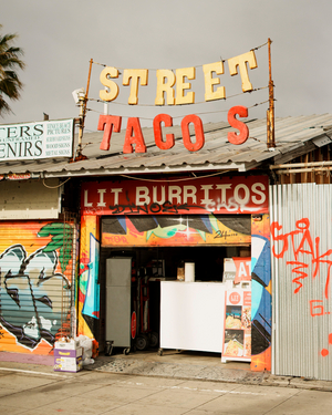 Lit Burritos on the boardwalk in Venice Beach, Los Angeles, California, USA, 2025 (photo)