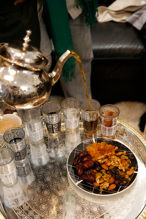 Serving tea at the Saint-Ouen sufi dergah, France (photo)