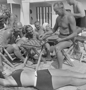 Men and women aboard a ship, 1930s (photo)
