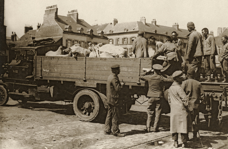 A Chinese labour party unloading meat, Western Front, 1914-18 (b/w photo)
