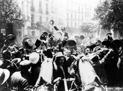 Edouard Drumont greeting a crowd of his supporters during the election campaign for deputies in Algiers, 1898 (b/w photo)
