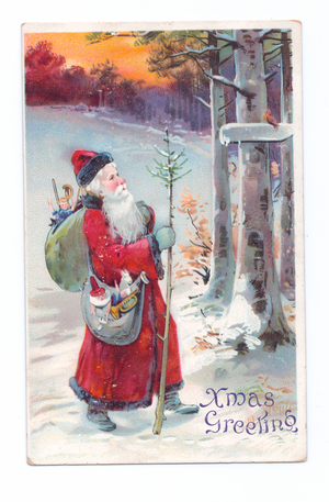 Edwardian Christmas postcard of Father Christmas walking through the snow with a sack of toys on his shoulder, c.1910 (colour litho)