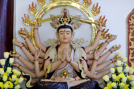 Thousand-armed Avalokitesvara, the Bodhisattva of Compassion.  Vietnam. (sculpture)