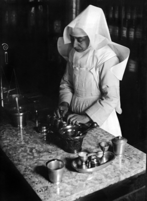 Nun in the 'Hospital Hotel-Dieu' in Beaune, 1932 (b/w photo)