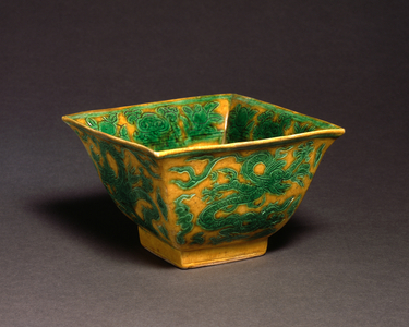 Square Bowl with Design of Dragons amidst Clouds, Symbols of Longevity, and Shou Character, mid-16th century (porcelain with incised and overglaze polychrome enamel decoration & underglaze cobalt blue reign mark)
