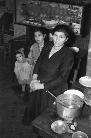 MOTHER AND DAUGHTERS IN THE KITCHEN, , 1957 (photo)