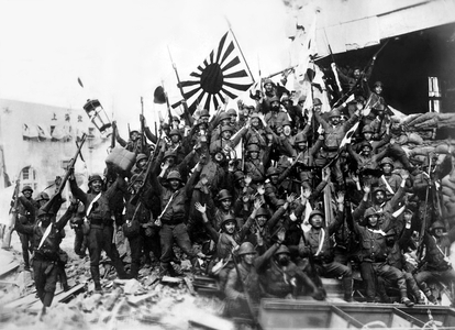 Japan: Soldiers of the Imperial Japanese army, waving the Japanese Naval Standard, celebrate victory at Shanghai, 1937