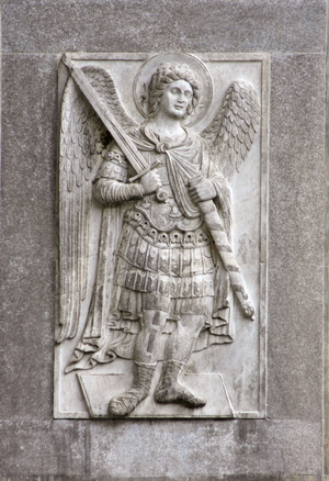 Low relief sculpture of the Archangel Michael on the north facade of the Basilica of San Marco, Venice (photo)
