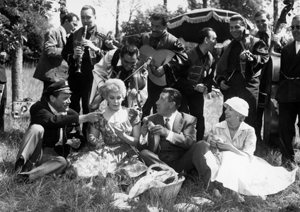 London, England, U.K. - Actress KIM NOVAK during a picnic with EDDIE CONSTANTINE, FERNANDEL and MADAME CONSTANTINE, 23rd May 1956 (photo)