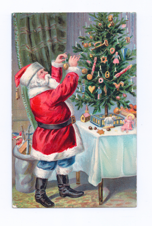 Edwardian postcard of Father Christmas decorating a Christmas tree, c.1910 (colour litho)