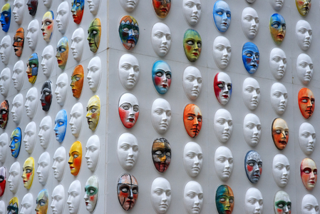 Vittorio Emanuele gallery interior, Milan, Italy. Faces, decoration of the Gucci store, 2017 (photo)