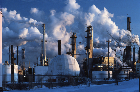 Quebec: Montreal - one of several Montreal East oil refineries at mid-winter.  (photo)