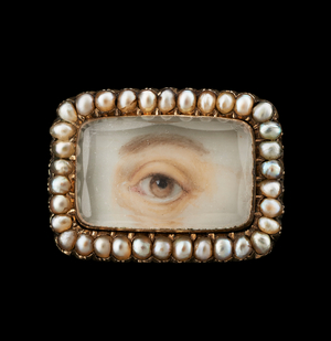 An Eye Miniature with Brown Iris, c.1800 (w/c on beveled glass with pearls set in gold)