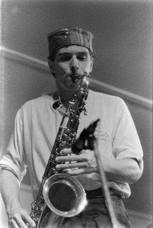 Black and white photo of Steve Dyer playing the tenor saxophone at Eddels Sports and Socia… (photo)