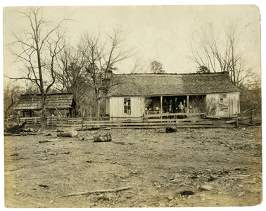 An Arkansas home 40 miles from a railroad, 1903 (gelatin silver photo)