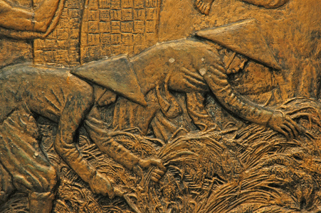 Presidential Palace, wall carving: workers in the field, Ho Chi Minh City, Vietnam