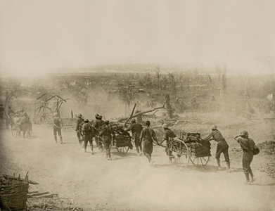 Troops moving up to the front during the attack on Contalmaison, 1916 (b/w photo)