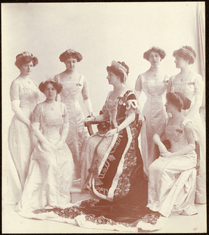 Duchess Evelyn, Mistress of the Robes and trainbearers, 1911 (b/w photo)
