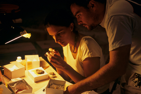 Urkesh, Hurrian Empire, Syria, 2400 BC, Sophie Bonetti examines an artifact, 2004 (photo)