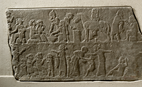 Diasplaced Elamites having a meal in an encampment …