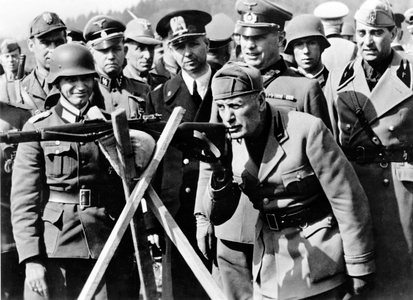 The motif from National Socialist propaganda shows the Italian Prime Minister of the 'Republic of Salo', Benito Mussolini (front) and the Ambassador Filippo Anfuso (right) , during a visit of Italian troops on a military training area, 26th April 1944 (b/w photo)