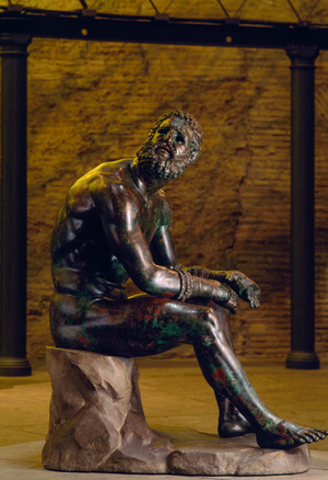 A bronze Roman statue which depicts a boxer at rest. Museo Nazionale Romano, Rome, Italy., 1990s (photo)