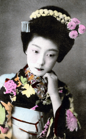 Hand-tinted portrait of a "maiko" (apprentice geisha), Osaka, c. 1910