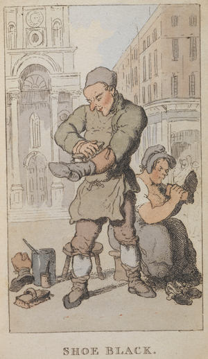 'Shoe black'. A man and woman polishing shoes in a street.