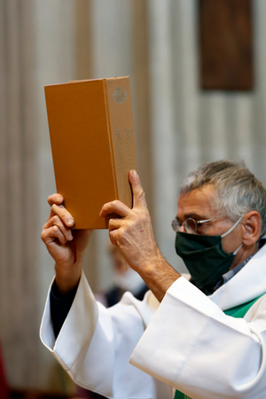 Catholic church during covid-19 epidemic. Mass celebration. Liturgy of the word.  Sallanches.  France.