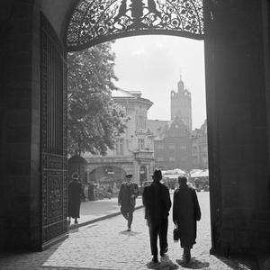 At the entrance gate of Darmstadt castle, Germany 1930s (b/w photo)