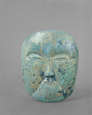 Gilt bronze Death Mask, early 10th - early
12th Century (bronze with gilt)
