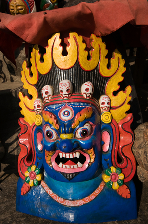 NEPAL, Kathmandu, Swayambhunath Buddhist Temple, painted demon mask