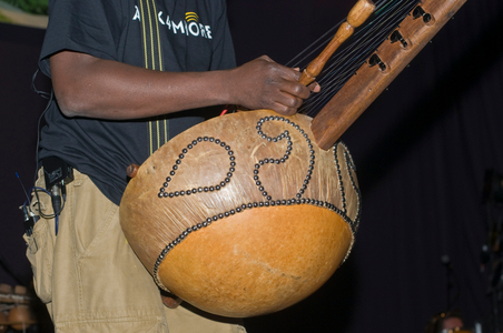 Kora detail showing strings and hand position
