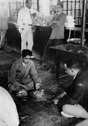 Counting money at the Iranian Bank, 1929 (b/w photo)