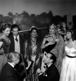 In Paris on January 6, 1952, during Party of Hairtsyle : L-R : Jacqueline Donny, Serge Lifar, ?, Danielle Ganne and Totote Bergineau and Hairdresser Antonio (Kneeling) (b/w photo)