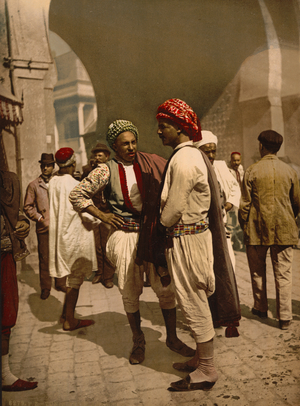Turbanned men in Tunis, c.1899 (photochrom)