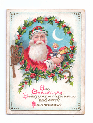 Edwardian Christmas postcard of Father Christmas in the middle of a holly wreath holding a doll,, c.1910 (colour litho)