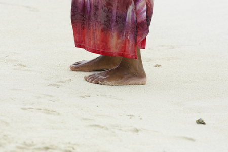 Local barefoot on the Beach, Mauritius (photo)